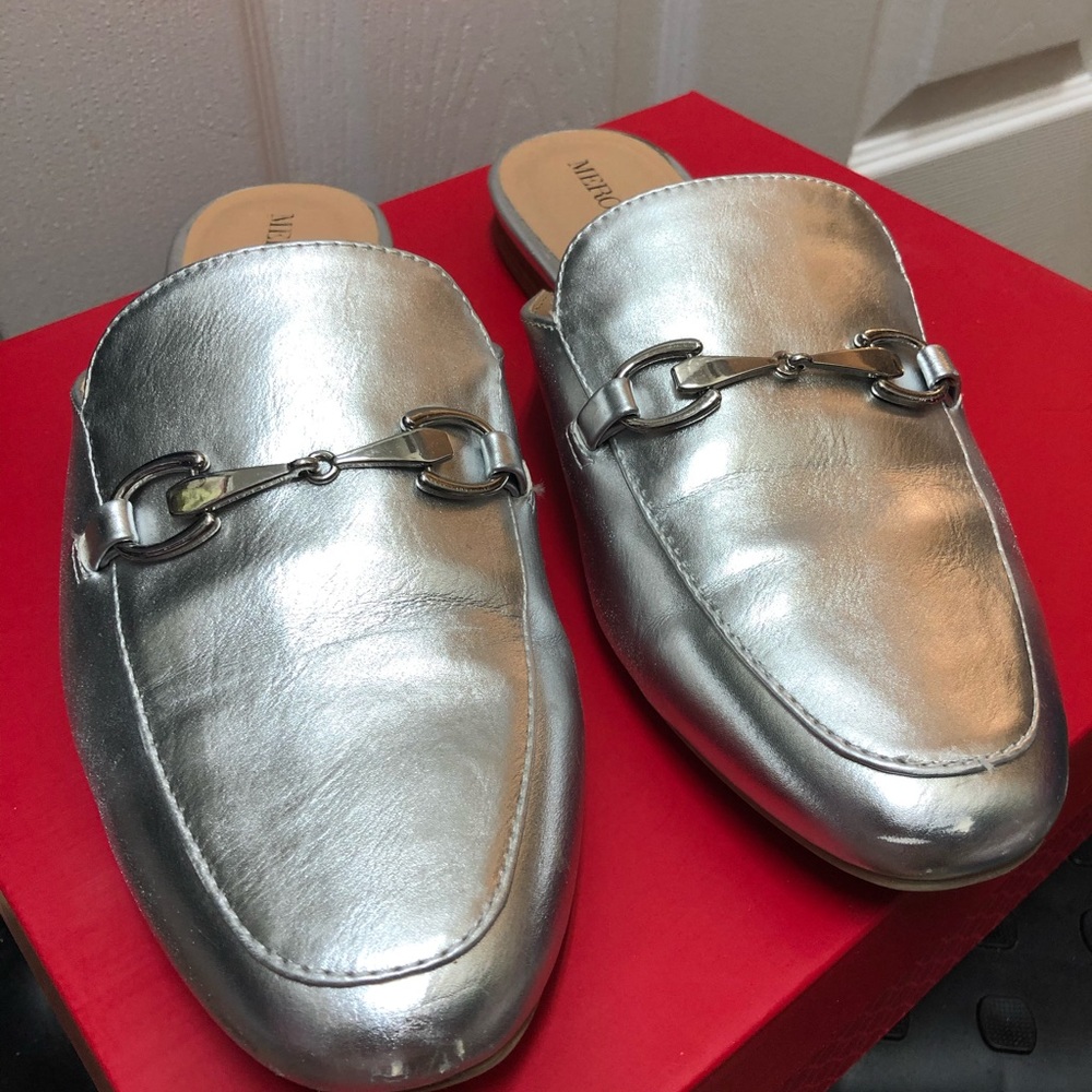 Sliver slip on loafers.